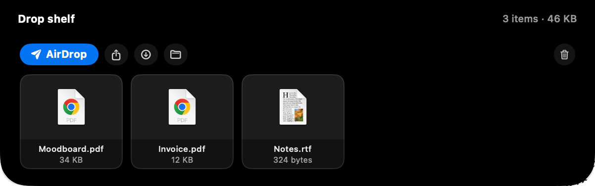 The drop shelf card holding three files with AirDrop, share, save and reveal buttons