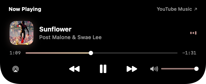 The music card playing from a browser with artwork and controls